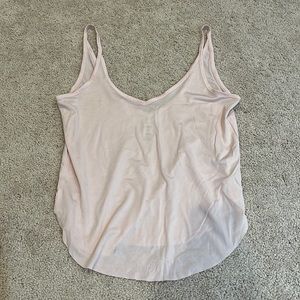 Light pale pink deep v tank top on front and back